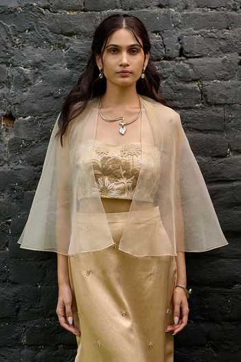 Shop Vedangi Agarwal Gold Organza Bandeau Neck Embroidered Cape Top And Skirt Set Online at Aza Fashions Shop_Vedangi Agarwal_Gold Organza Bandeau Neck Embroidered Cape Top And Skirt Set _Online_at_Aza_Fashions