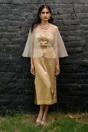 Vedangi Agarwal Gold Organza Bandeau Neck Embroidered Cape Top And Skirt Set at Aza Fashions Vedangi Agarwal_Gold Organza Bandeau Neck Embroidered Cape Top And Skirt Set _at_Aza_Fashions