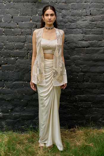 Vedangi Agarwal Ivory Brocade, Organza, Shantoon Bandeau Neck Hand Embellished Jacket Skirt Set at Aza Fashions Vedangi Agarwal_Ivory Brocade, Organza, Shantoon Bandeau Neck Hand Embellished Jacket Skirt Set _at_Aza_Fashions