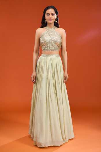 Shop Basanti Kapde aur Koffee Green Georgette, Net Halter Neck Sequin Blouse Lehenga Set Online at Aza Fashions Shop_Basanti Kapde aur Koffee_Green Georgette, Net Halter Neck Sequin Blouse Lehenga Set _Online_at_Aza_Fashions