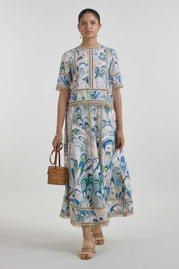 SOBARIKO Blue Linen Round Neck Penelope Print Rafia Top And Skirt Set Online at Aza Fashions SOBARIKO_Blue Linen Round Neck Penelope Print Rafia Top And Skirt Set _Online_at_Aza_Fashions
