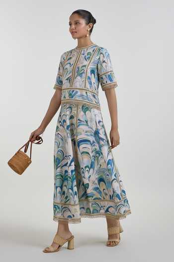 Buy SOBARIKO Blue Linen Round Neck Penelope Print Rafia Top And Skirt Set Online at Aza Fashions Buy_SOBARIKO_Blue Linen Round Neck Penelope Print Rafia Top And Skirt Set _Online_at_Aza_Fashions