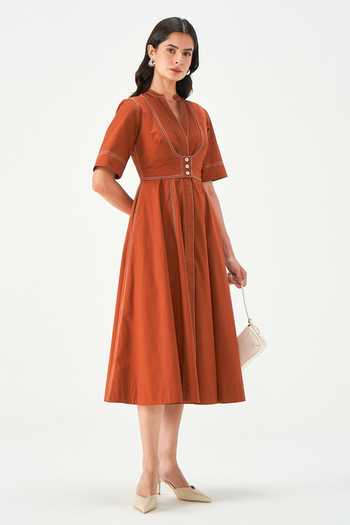 Buy NOTEBOOK Rust Cotton Mandarin Collar, Split V-neck Elisa Pleated Dress Online at Aza Fashions Buy_NOTEBOOK_Rust Cotton Mandarin Collar, Split V-neck Elisa Pleated Dress _Online_at_Aza_Fashions