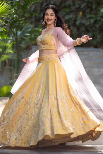 Buy Devkalii Yellow Tissue, Crepe Sweetheart Neck Floral Hand Embroidered Lehenga Set Online at Aza Fashions Buy_Devkalii_Yellow Tissue, Crepe Sweetheart Neck Floral Hand Embroidered Lehenga Set _Online_at_Aza_Fashions