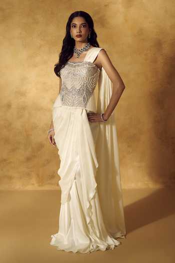 Buy Rashika Sharma Ivory Satin, Net Embroidery, Sequins, Beads, Irina Pre-draped Saree With Corset Online at Aza Fashions Buy_Rashika Sharma_Ivory Satin, Net Embroidery, Sequins, Beads, Irina Pre-draped Saree With Corset _Online_at_Aza_Fashions