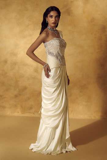 Shop Rashika Sharma Ivory Satin, Net Embroidery, Sequins, Beads, Irina Pre-draped Saree With Corset Online at Aza Fashions Shop_Rashika Sharma_Ivory Satin, Net Embroidery, Sequins, Beads, Irina Pre-draped Saree With Corset _Online_at_Aza_Fashions