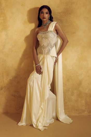 Buy Rashika Sharma Ivory Satin, Net Embroidery, Sequins, Beads, Irina Pre-draped Saree With Corset Buy_Rashika Sharma_Ivory Satin, Net Embroidery, Sequins, Beads, Irina Pre-draped Saree With Corset