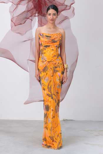 Vesture_Yellow Lycra, Mesh Bandeau Neck Naaz Print Corset And Draped Skirt Set _at_Aza_Fashions