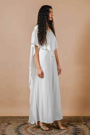 Swatee Singh Ivory Crepe, Satin V-neck Moon Orchid Heavy And Jumpsuit Online at Aza Fashions Swatee Singh_Ivory Crepe, Satin V-neck Moon Orchid Heavy And Jumpsuit _Online_at_Aza_Fashions