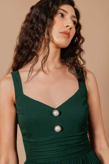 Swatee Singh_Emerald Green Georgette, Crepe Sweetheart Neck Camellia Pleated Midi Dress _at_Aza_Fashions