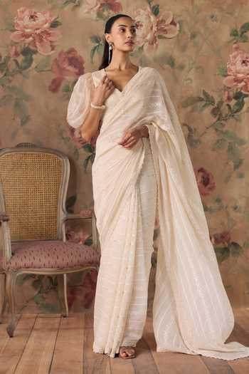 Kritika Dawar Ivory Chanderi V-neck Nisa Hand Embroidered Saree And Blouse Set at Aza Fashions Kritika Dawar_Ivory Chanderi V-neck Nisa Hand Embroidered Saree And Blouse Set _at_Aza_Fashions