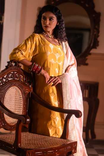 Shorshe Clothing Yellow Silk, Modal, Brocade Round Shahi Kurta With Dusty Pink Cigarette Pant Online at Aza Fashions Shorshe Clothing_Yellow Silk, Modal, Brocade Round Shahi Kurta With Dusty Pink Cigarette Pant _Online_at_Aza_Fashions