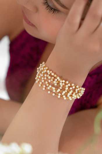 Buy Do Taara Gold Plated Pearls Embellished Bracelet Online at Aza Fashions Buy_Do Taara_Gold Plated Pearls Embellished Bracelet _Online_at_Aza_Fashions