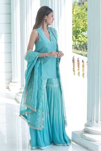 Monk & Mei By Sonia Anand Blue Georgette, Cotton V-neck Stella Short Kurta Chikankari Sharara Set Online at Aza Fashions Monk & Mei By Sonia Anand_Blue Georgette, Cotton V-neck Stella Short Kurta Chikankari Sharara Set _Online_at_Aza_Fashions