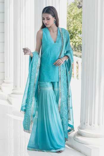 Shop Monk & Mei By Sonia Anand Blue Georgette, Cotton V-neck Stella Short Kurta Chikankari Sharara Set Online at Aza Fashions Shop_Monk & Mei By Sonia Anand_Blue Georgette, Cotton V-neck Stella Short Kurta Chikankari Sharara Set _Online_at_Aza_Fashions