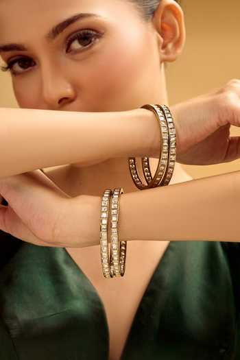 Nazaakat By Samara Singh White Crystals Gold And Stone Embellished Bangle Set at Aza Fashions Nazaakat By Samara Singh_White Crystals Gold And Stone Embellished Bangle Set _at_Aza_Fashions