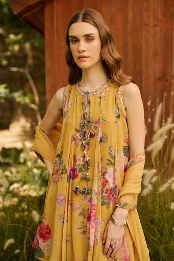 Ridhi Mehra_Yellow Georgette, Net Round Neck Gleam Print Kurta Gharara Set _Online_at_Aza_Fashions