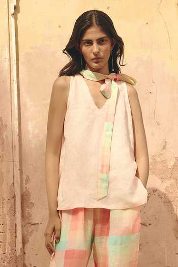 Shop Nirvanaa Peach Linen V-neck Nia Eda Tie Up Top And Pant Set Online at Aza Fashions Shop Nirvanaa_Peach Linen V-neck Nia Eda Tie Up Top And Pant Set _Online_at_Aza_Fashions