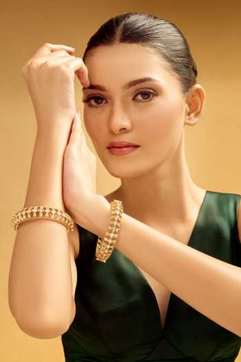 Nazaakat By Samara Singh Gold Brass Cutwork Bangle Set 