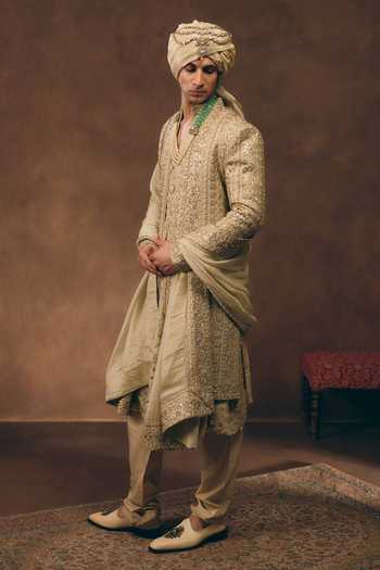 Buy MUKTI AND KAVITH CASA Gold Chanderi, Silk, Organza Signature Embellished Sherwani Set Online at Aza Fashions Buy_MUKTI AND KAVITH CASA_Gold Chanderi, Silk, Organza Signature Embellished Sherwani Set _Online_at_Aza_Fashions