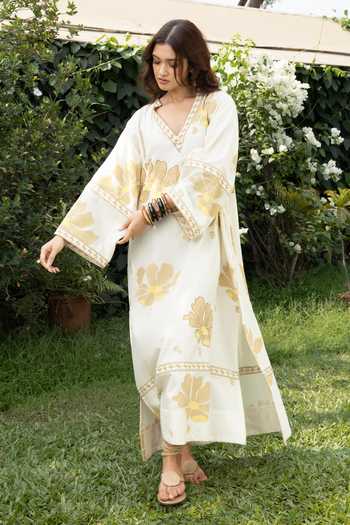 Akashi Clothing Yellow Cotton V-neck Border Embroidered Kaftan at Aza Fashions Akashi Clothing_Yellow Cotton V-neck Border Embroidered Kaftan _at_Aza_Fashions