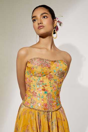 Aum By Asit And Ashima Yellow Satin Embroidery, Sequins Bandeau Sunlit Bloom Print Corset And Skirt Set Online at Aza Fashions Aum By Asit And Ashima_Yellow Satin Embroidery, Sequins Bandeau Sunlit Bloom Print Corset And Skirt Set _Online_at_Aza_Fashions