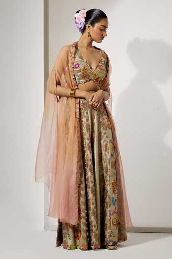 Aum By Asit And Ashima Beige Silk, Brocade V-neck Gold Embroidered Cape Sharara Set at Aza Fashions Aum By Asit And Ashima_Beige Silk, Brocade V-neck Gold Embroidered Cape Sharara Set _at_Aza_Fashions