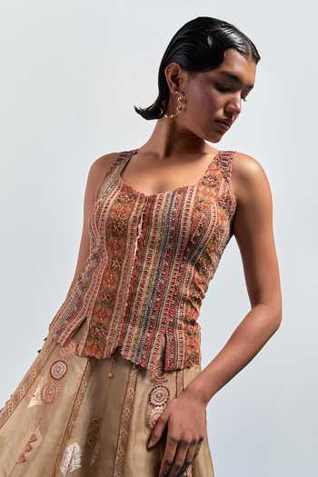 Aum By Asit And Ashima Beige Silk, Organza Beads, Tassels V-neck Embroidered Skirt And Corset Set at Aza Fashions Aum By Asit And Ashima_Beige Silk, Organza Beads, Tassels V-neck Embroidered Skirt And Corset Set _at_Aza_Fashions