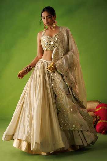 Kisakshi Jaipur Beige Silk, Tissue Sweetheart Neck Mirror Embroidered Lehenga Set Online at Aza Fashions Kisakshi Jaipur_Beige Silk, Tissue Sweetheart Neck Mirror Embroidered Lehenga Set _Online_at_Aza_Fashions