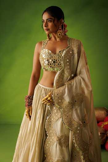 Kisakshi Jaipur Beige Silk, Tissue Sweetheart Neck Mirror Embroidered Lehenga Set at Aza Fashions Kisakshi Jaipur_Beige Silk, Tissue Sweetheart Neck Mirror Embroidered Lehenga Set _at_Aza_Fashions