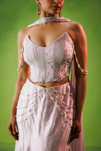 Kisakshi Jaipur Lavender Organza, Chanderi Sequins, Beads V-neck Embroidered Corset Skirt Set at Aza Fashions Kisakshi Jaipur_Lavender Organza, Chanderi Sequins, Beads V-neck Embroidered Corset Skirt Set _at_Aza_Fashions