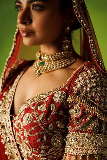 Buy Kisakshi Jaipur Red Silk, Net V-neck Bridal Raw Embroidered Lehenga Set Online at Aza Fashions Buy_Kisakshi Jaipur_Red Silk, Net V-neck Bridal Raw Embroidered Lehenga Set _Online_at_Aza_Fashions