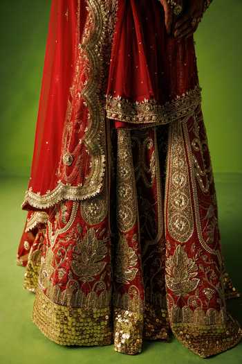 Shop Kisakshi Jaipur Red Silk, Net V-neck Bridal Raw Embroidered Lehenga Set Online at Aza Fashions Shop_Kisakshi Jaipur_Red Silk, Net V-neck Bridal Raw Embroidered Lehenga Set _Online_at_Aza_Fashions