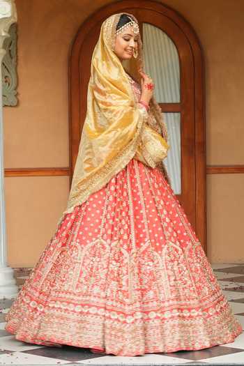Buy_Amaltas Couture_Coral Silk, Organza, Net, Tissue V-neck Raw Bridal Lehenga Set _Online_at_Aza_Fashions
