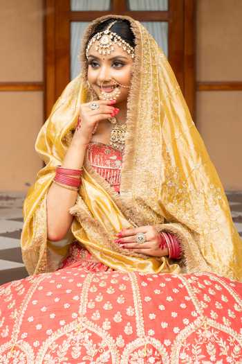 Shop_Amaltas Couture_Coral Silk, Organza, Net, Tissue V-neck Raw Bridal Lehenga Set _Online_at_Aza_Fashions