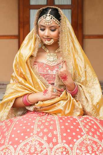 Amaltas Couture_Coral Silk, Organza, Net, Tissue V-neck Raw Bridal Lehenga Set _at_Aza_Fashions