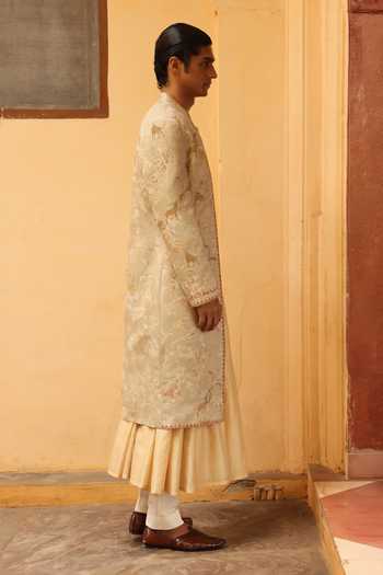 Shop Aum By Asit And Ashima Ivory Jacquard, Chanderi Silk, Cotton, Lycra Embroidered Sherwani Set at Aza Fashions Shop_Aum By Asit And Ashima_Ivory Jacquard, Chanderi Silk, Cotton, Lycra Embroidered Sherwani Set _at_Aza_Fashions