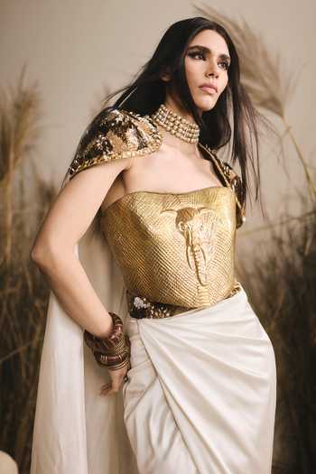 Buy ASHNA VASWANI Gold Crepe, Chanderi, Satin Metallic Thread Bandeau Neck Cape And Corset Set Buy_ASHNA VASWANI_Gold Crepe, Chanderi, Satin Metallic Thread Bandeau Neck Cape And Corset Set