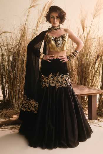 Shop ASHNA VASWANI Black Chanderi, Velvet, Satin Sweetheart Neck Lehenga Set With Brass Corset Online at Aza Fashions Shop_ASHNA VASWANI_Black Chanderi, Velvet, Satin Sweetheart Neck Lehenga Set With Brass Corset _Online_at_Aza_Fashions