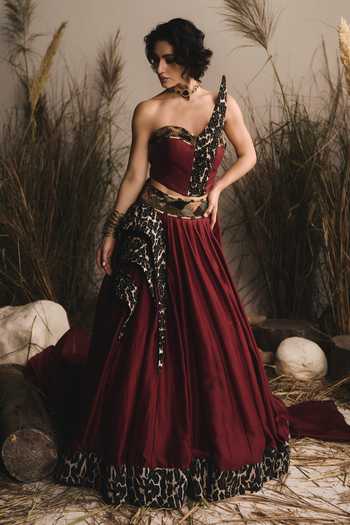 ASHNA VASWANI Maroon Chanderi Sequins, Pearls, Cut Work Cheetah Print Corset And Lehenga Set at Aza Fashions ASHNA VASWANI_Maroon Chanderi Sequins, Pearls, Cut Work Cheetah Print Corset And Lehenga Set _at_Aza_Fashions