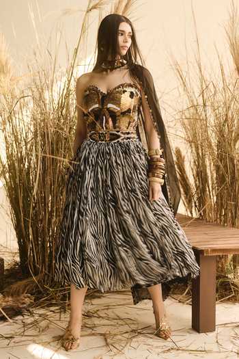 ASHNA VASWANI Gold Silk, Georgette, Organza, Satin Sequins Zebra Print Corset And Lehenga Set at Aza Fashions ASHNA VASWANI_Gold Silk, Georgette, Organza, Satin Sequins Zebra Print Corset And Lehenga Set _at_Aza_Fashions