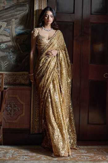 Seema Gujral_Gold Net Sweetheart Neck Antique Crystal Saree With Blouse _Online_at_Aza_Fashions