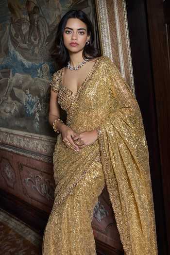 Shop_Seema Gujral_Gold Net Sweetheart Neck Antique Crystal Saree With Blouse _Online_at_Aza_Fashions