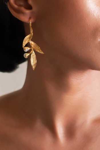 Buy Dhwani Bansal Jewellery Gold Plated Haya Textured Leaf Motif Earrings at Aza Fashions Buy_Dhwani Bansal Jewellery_Gold Plated Haya Textured Leaf Motif Earrings _at_Aza_Fashions