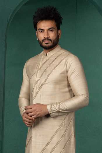 Buy POONAM KASERA Beige Silk, Dupion Diagonal Pintucks Kurta Set Online at Aza Fashions Buy_POONAM KASERA_Beige Silk, Dupion Diagonal Pintucks Kurta Set _Online_at_Aza_Fashions