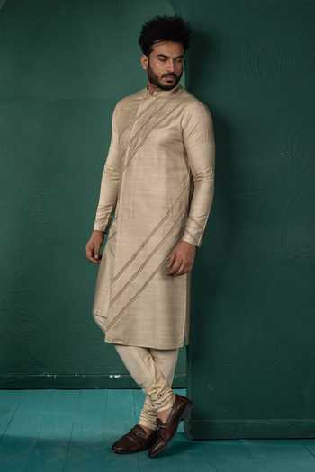 POONAM KASERA Beige Silk, Dupion Diagonal Pintucks Kurta Set at Aza Fashions POONAM KASERA_Beige Silk, Dupion Diagonal Pintucks Kurta Set _at_Aza_Fashions