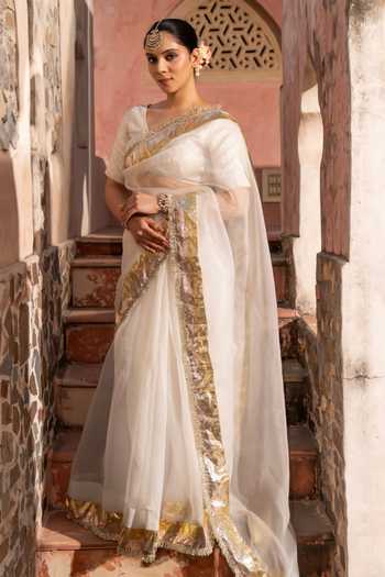 Zal From Benaras Gold Organza Gota Border Saree With Unstitched Blouse Fabric Online at Aza Fashions Zal From Benaras_Gold Organza Gota Border Saree With Unstitched Blouse Fabric _Online_at_Aza_Fashions