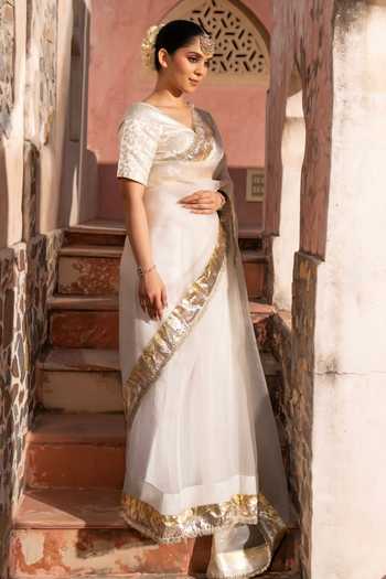 Shop Zal From Benaras Gold Organza Gota Border Saree With Unstitched Blouse Fabric Online at Aza Fashions Shop_Zal From Benaras_Gold Organza Gota Border Saree With Unstitched Blouse Fabric _Online_at_Aza_Fashions