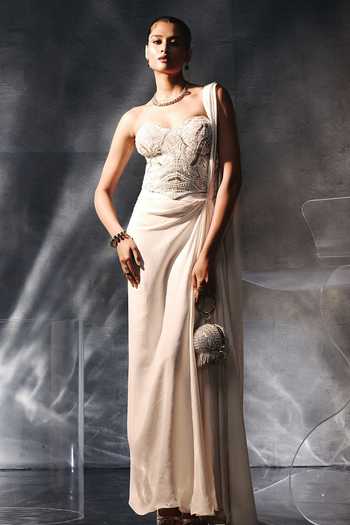 Shop Kalighata Pret White Satin Sequins, Beads, Stones Pre-draped Saree With Embellished Corset at Aza Fashions Shop_Kalighata Pret_White Satin Sequins, Beads, Stones Pre-draped Saree With Embellished Corset _at_Aza_Fashions