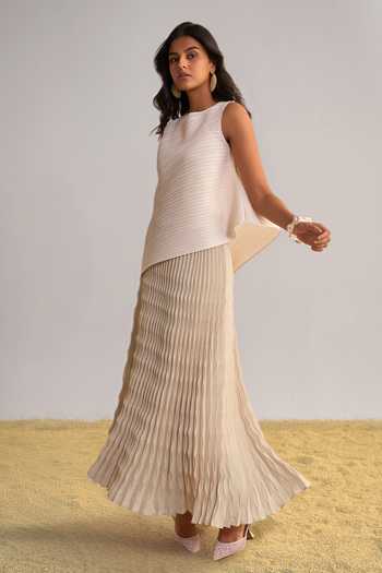 Buy Dash And Dot Beige Polyester Round Neck Asymmetric Pleated Top And Skirt Set Online at Aza Fashions Buy_Dash And Dot_Beige Polyester Round Neck Asymmetric Pleated Top And Skirt Set _Online_at_Aza_Fashions